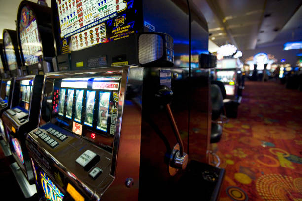 Mobile phone screen showing live dealer table interface with betting buttons and video stream